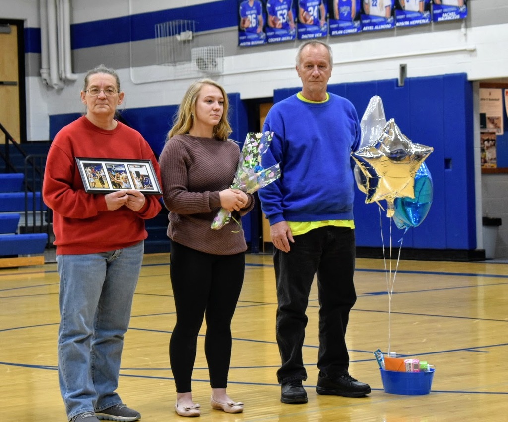 Seniors Cooper Ingels, Kaylin Kent-Thomas and Rosita Hepperle and their parents were honored